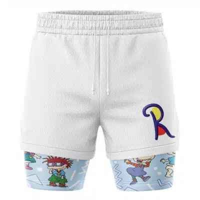 The Jimmy Neutron Nickelodeon 2-in-1 Performance Shorts feature a white mesh design, an elastic waistband with drawstrings, a colorful R on the left thigh, and cartoon characters with geometric shapes on light blue at the bottom.