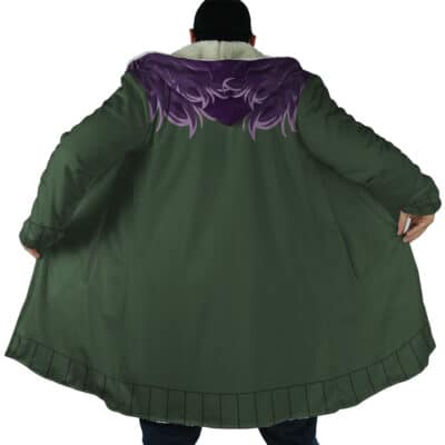 A person wearing the Shinigami Death Seal Shippuden Dream Cloak Coat stands with their back to the camera, holding the long, dark green coat with a white fur collar and purple shoulder design open with both hands.