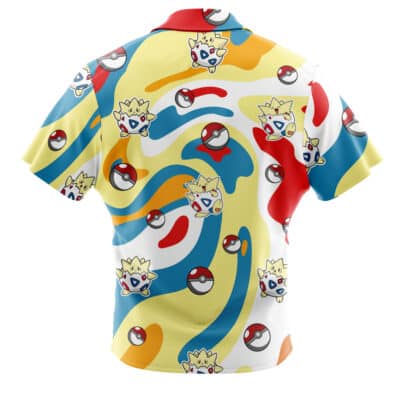 Default Button Up Hawaiian Shirt (Copy): This short-sleeved, collared, button-down shirt features a vibrant Hawaiian design with swirling yellow, blue, white, and red patterns. The fabric is adorned with repeating images of Togepi and Poké Balls from Pokémon for a playful touch.