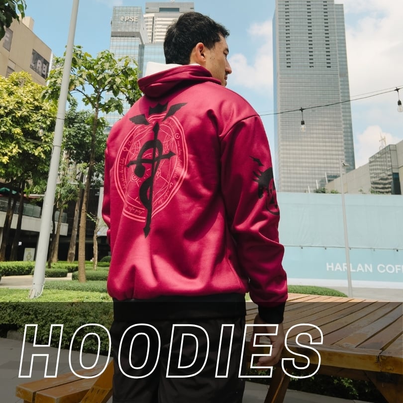 A person wearing a magenta hoodie with a black Fullmetal Alchemist transmutation circle graphic on the back, with the word HOODIES overlaid in large white text at the bottom.